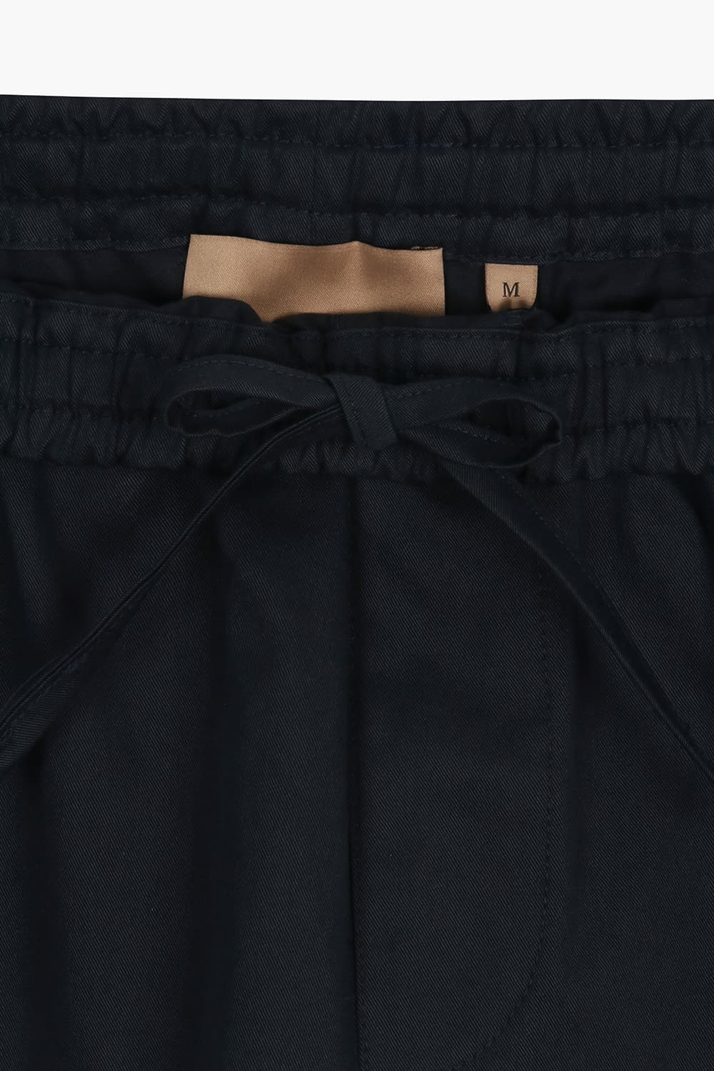 미니멀 사이드 포켓 하프 팬츠 블랙 QE5SMRDPT105Q66