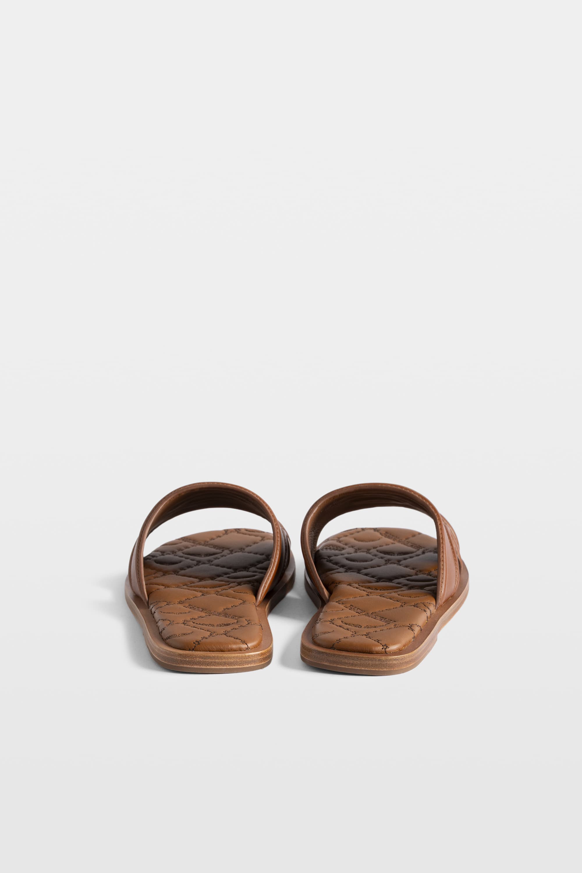 Monogram Leather Mules